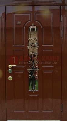 Красивая металлическая дверь со стеклом и ковкой ДСК-33 в Вологде